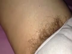 The pubic hair of my white bitch sticking out of her pants